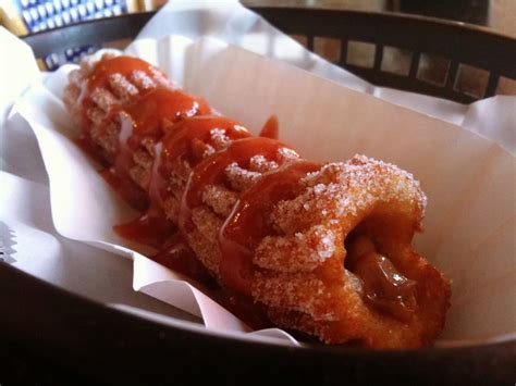 Churro Grande Filled With Dulce De Leche And Topped With