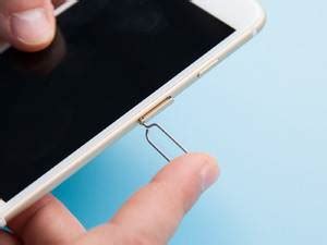 Gently press the paperclip until the sim tray pops out of the iphone. How to Insert a SIM Card into a Mobile Phone | US Mobile How to Insert a SIM Card into a Mobile ...