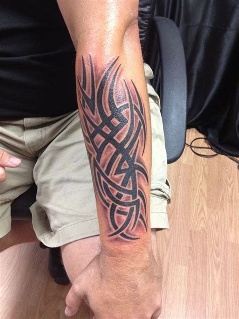 22 Interesting Tribal Forearm Tattoos