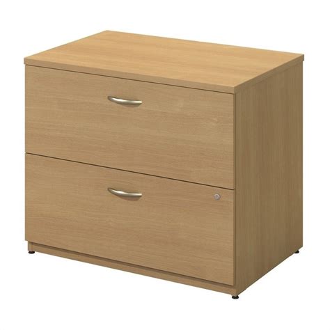 Crafted of solid oak wood and covered in a distressed finish, this file cabinet knows how to impress with its impeccable design. BBF Series C 2 Drawer Lateral Wood File Storage Light Oak ...