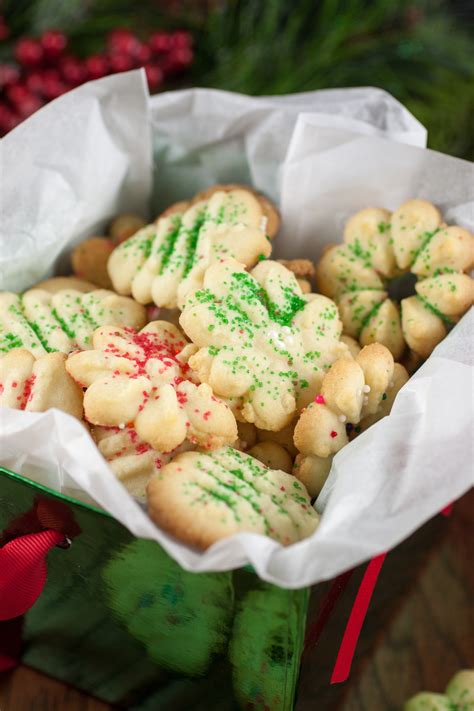 Christmas cookies or christmas biscuits are traditionally sugar cookies or biscuits (though other flavours may be used based on family traditions and individual preferences) cut into various shapes related to christmas. Spritzgebäck - German Christmas Cookies | Traveling Chic