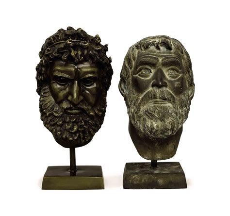 Two Patinated Bronze Heads