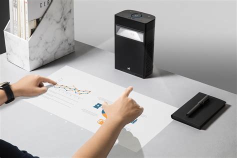 Smart Projector Puts A Touchscreen On Your Desk A Movie On Your Wall