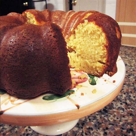 Using an electric mixer, cream butter until fluffy. Paula Deen's Georgia Pound Cake | Recipe | Pound cake ...