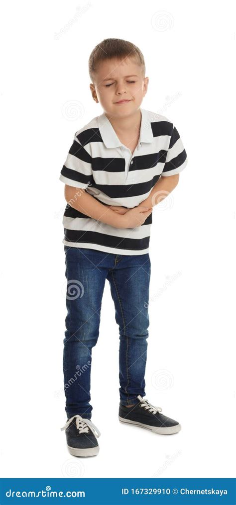 Little Boy Suffering From Stomach Ache On Background Stock Photo