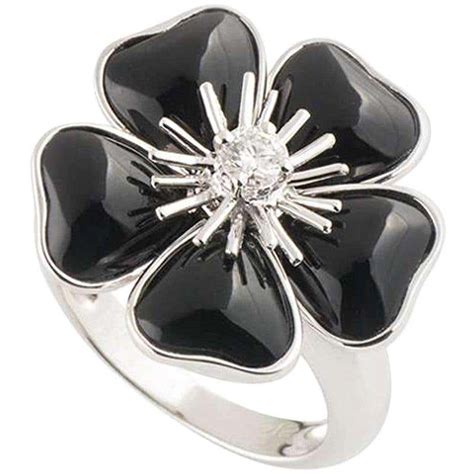 Van Cleef And Arpels Diamond And Onyx Nerval Flower Ring At 1stdibs
