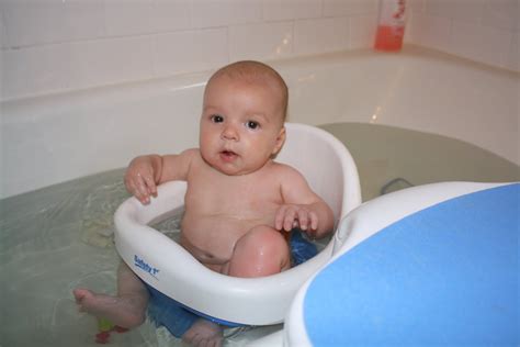 Great for bathing a newborn + toddler together; Living this life with them....: Bath Seat