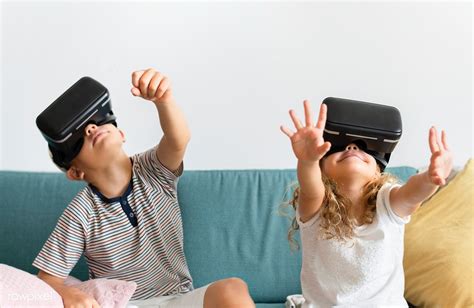 Download Premium Image Of Little Kids Watching Movies On Their Vr