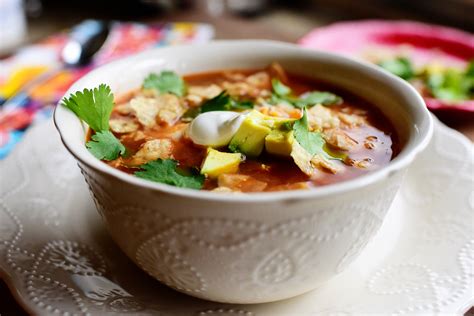 Serve with sour cream and cheese on top, with either tortilla chips or cornbread on the side. Slow Cooker Chicken Tortilla Soup | KeepRecipes: Your ...
