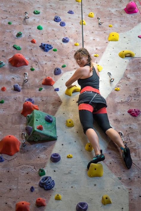 Woman Practicing At Indoor Rock Climbing Gym Stock Photo Image Of