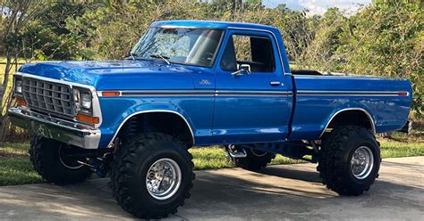 Blue 1979 Ford F 150 4x4 On Super Swampers Video Ford Daily Trucks