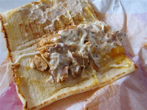 Top flatbreads with chicken and bacon mix, lettuce, tomato, the preferred amount of ranch, and shredded cheese. Review: Taco Bell - Bacon Ranch Chicken Flatbread Sandwich ...