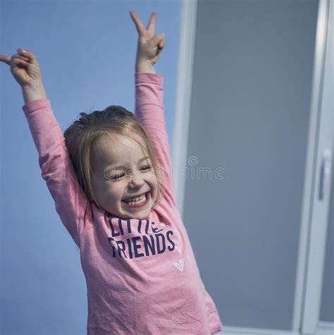 Happy And Smiling Cute Young Girl Hold Hands Up Stock Image Image Of