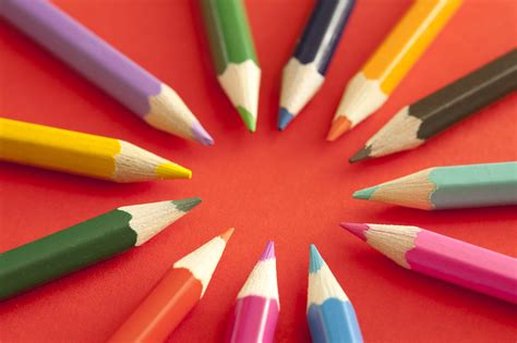 Free Stock Photo 12162 Colored pencils pointing toward each other | freeimageslive