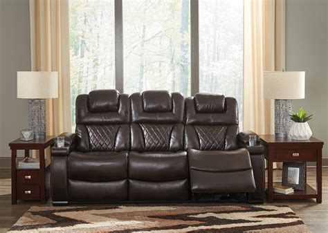 The Warnerton Chocolate Power Reclining Sofa With Adjustable Headrest