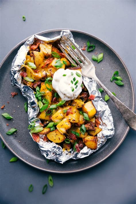 Easy, fast and no clean up campfire grilled loaded baked potatoes! Baked Potato Foil Packs (With Sausage!) | Chelsea's Messy ...