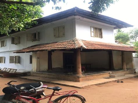 Ancestral Two Storey Tiled Building With Nadu Muttom For Sale At