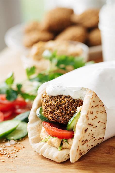 Falafel Wrap With Spicy Hummus And Creamy Lemon Garlic Dill Sauce