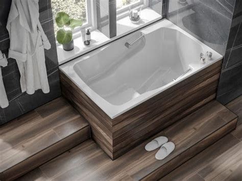 Your main materials should be wood, ceramic tile, and brushed metal finishes for your shower and bath hardware. Deep Soaking Tubs | Soaking tub, Deep soaking tub ...