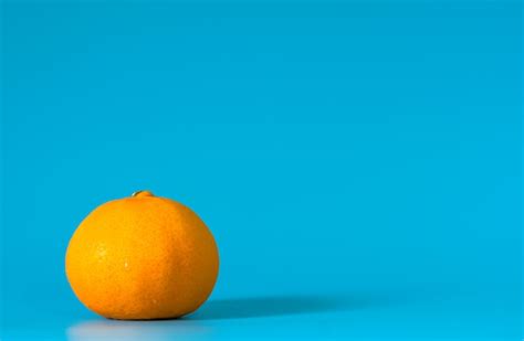 Premium Photo Summer Of Orange Fruit On Blue