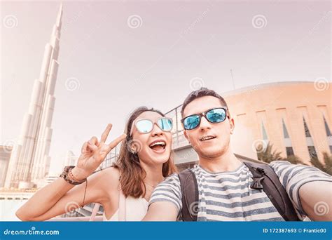 Friends A Man And A Woman Travel In Dubai And Take A Selfie Photo