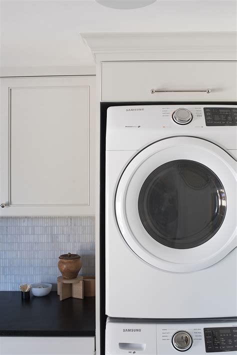 The kits distribute the weight and absorb some of the vibrations that occur when the machines are running. Built-In Stacked Washer and Dryer in Laundry Room - Room ...