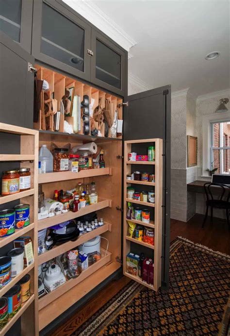 I like this shelf because there is a bar underneath that can be used to either hold a paper towel roll or hang other items with hooks. 35 Clever ideas to help organize your kitchen pantry