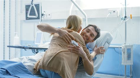 Wife Visiting Her Recovering Husband In The Hospital Stock Image F033 3205 Science Photo