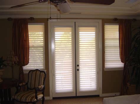 Vertical blinds are available in wood, fabric, and vinyl for a variety of looks. Window Treatment Ideas for Doors - 3 Blind Mice