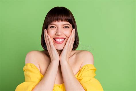 Photo Of Adorable Happy Attractive Young Woman Hold Hands Face Cheeks