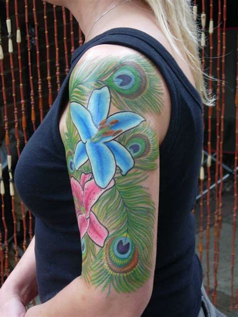 Peacock Feathers And Lillies Tattoo