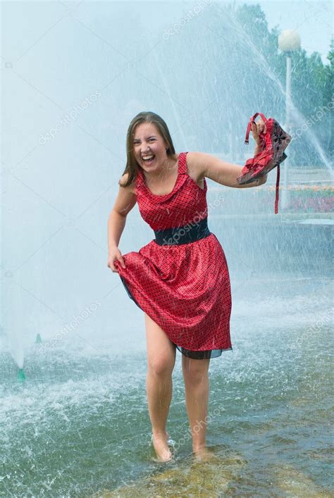 Girl In Wet Clothes In A City Fountain ⬇ Stock Photo Image By © Vikiri