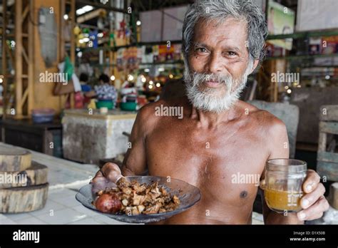 Man Getting Ready For Lunch Carbon Market Cebu Visayas Philippines South East Asia Stock