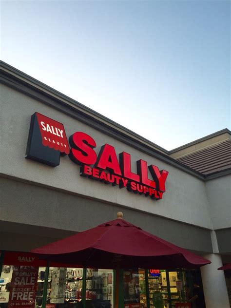 Outside View Of Sally's In The Shopping Center. Located To ...