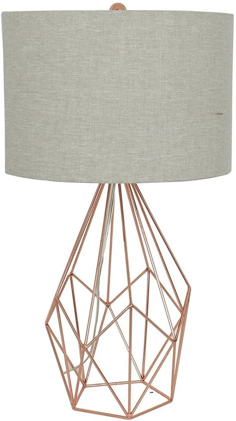 Featuring a complementing a beige linen with a bell shade silhouette, dimple creates a delightfully distorted effect with the circular hammered detail across its steel surface. Rose Gold Decor Ideas + Inspiration | Arts and Classy