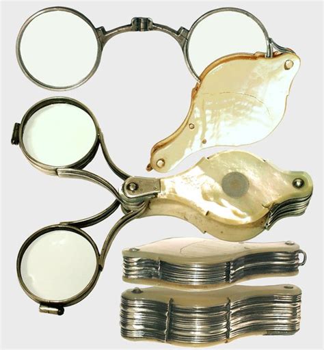 rare mid 19th century mother pearl and silver set of double magnifier and hinged lorgnette