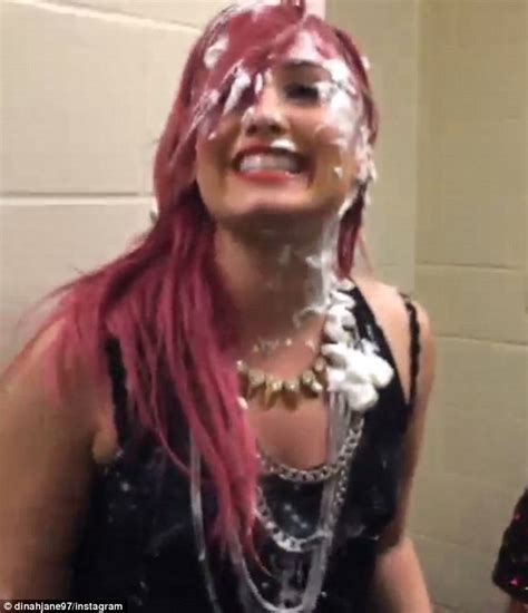 demi lovato proves she s a good sport as she receives a cream pie in the face courtesy of tour
