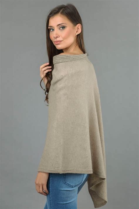 pure cashmere knitted asymmetric poncho wrap in camel brown italy in cashmere uk