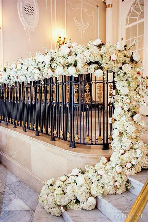 Anytime you wrap a gift, you try to add a flower. 40 Elegant Ways to Decorate Your Wedding with Floral Garlands | Tulle & Chantilly Wedding Blog