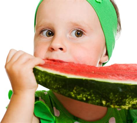 Little Boy Eating a Watermelon at a Table Stock Photo - Image of ...