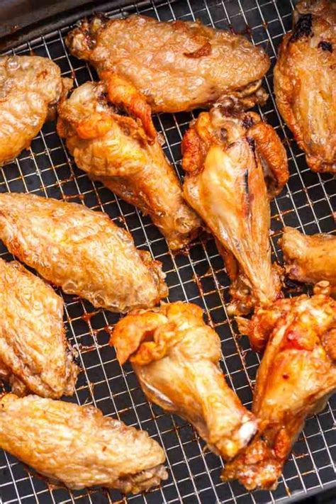 Cook the chicken wings for a total of 16 minutes, flipping them half way through cooking. Air Fryer Chicken Wings {Extra Crispy!} | Plated Cravings