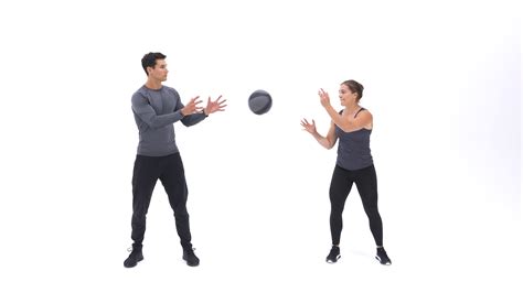 Sport Women Doing Exercise By Medicine Ball Throw To Chase Pose Exercise For The Chest Leg And