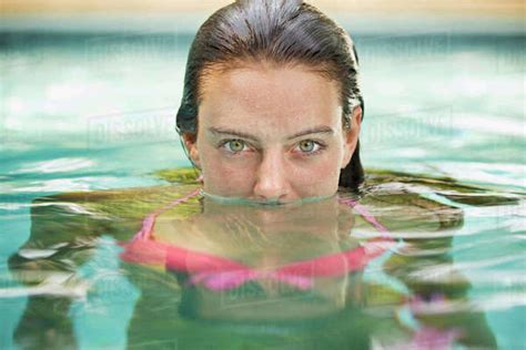 Woman Swimming In Pool Stock Photo Dissolve