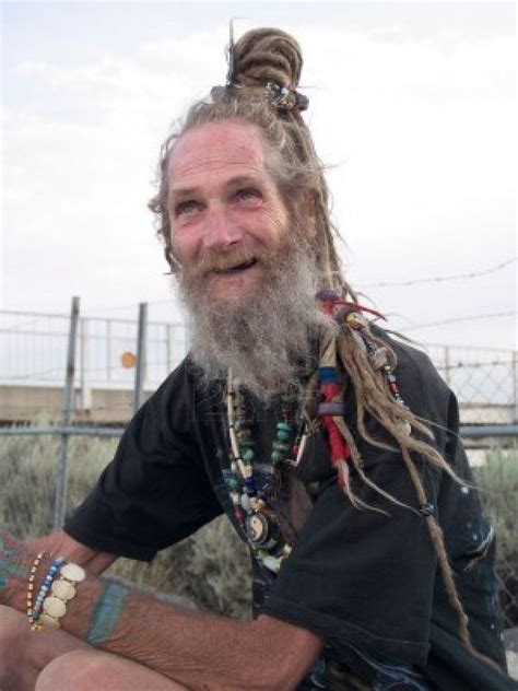 happy older gentleman with his dreadlocks on a bun dreadlocks dreads rasta man