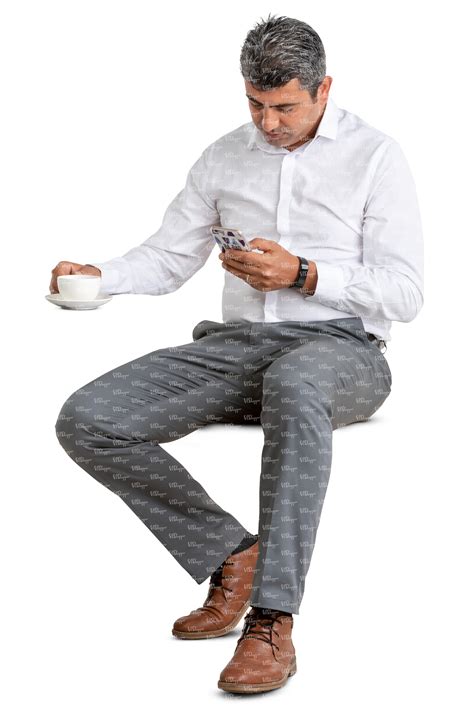 Man In A Suit Sitting In A Cafe And Drinking Coffee Vishopper