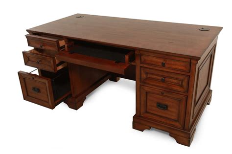 66 Seven Drawer Traditional Executive Desk In Oak Mathis Brothers