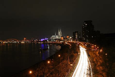 Rhine Shoreline In Cologne With Cathedral And Hohenzollern Bridge