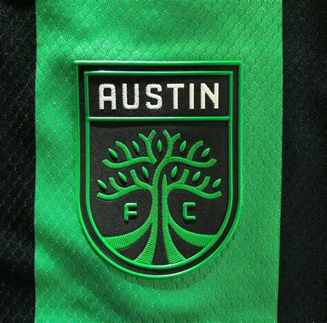 Download Austin Fc Soccer Club Embossed Logo Uniform Wallpaper