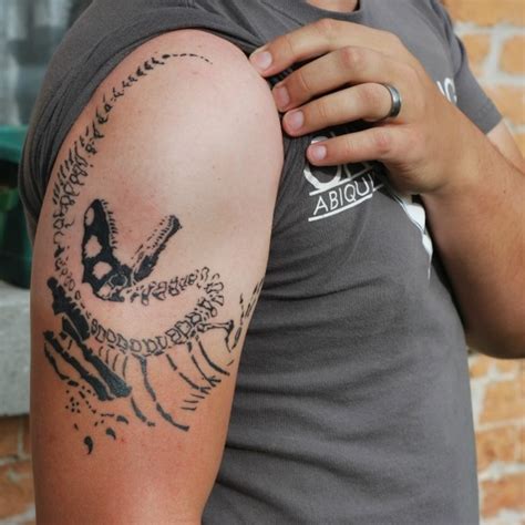 The Mysteries Of The Dinosaur Tattoo