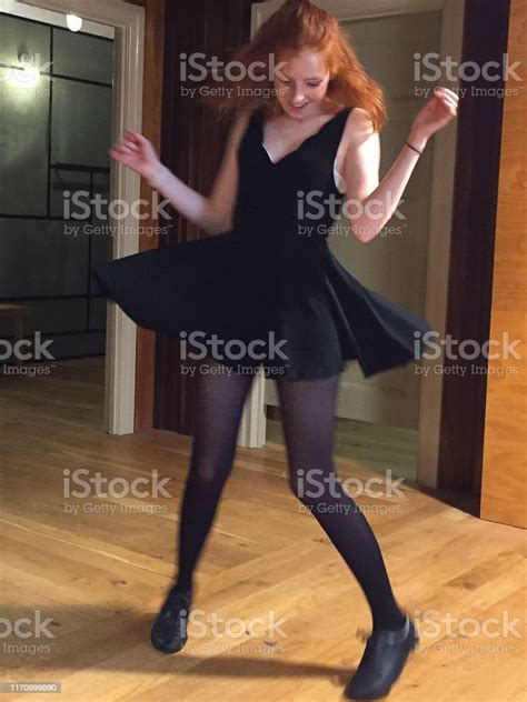 Image Of Young Teenage Redhead Girl Spinning Around In Little Black
